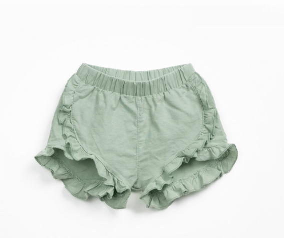 Calção de tecido com folhos